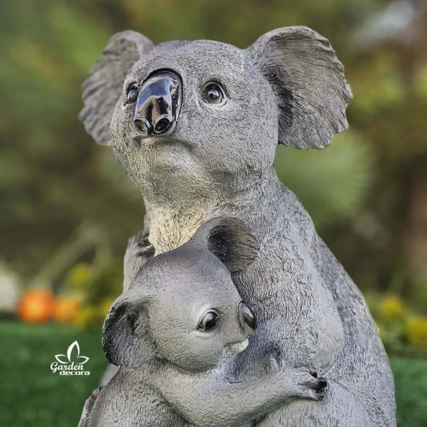 Koala con cachorros